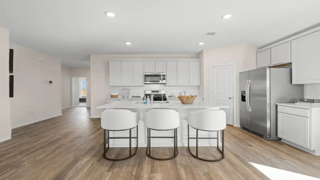 Furnished interior view inside a new home in Sunterra Lakes, Brookshire (Image 14).