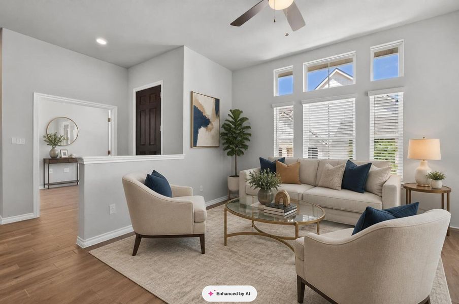 Natural light floods this inviting living space, highlighting its open-concept design and comfortable ambiance. Natural light floods this inviting living space, highlighting its open-concept design and comfortable ambiance.