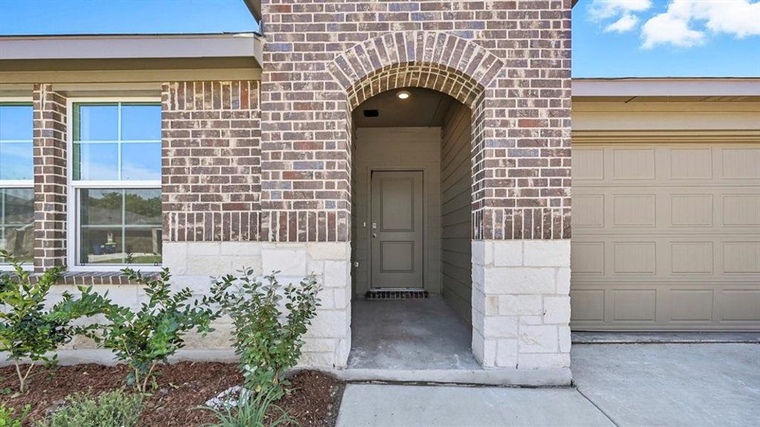 Exterior details and patio area of a home in Frontier Pointe, Princeton (Image 3).