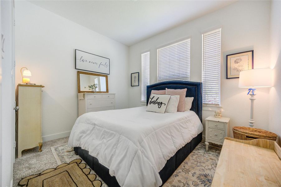 A well-sized secondary bedroom offering privacy and a bright, airy feel. A well-sized secondary bedroom offering privacy and a bright, airy feel.