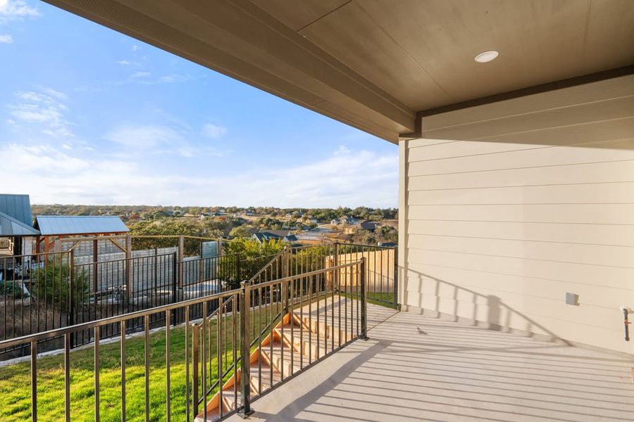 Exterior details and patio area of a home in Terrace Collection at Lariat, Liberty Hill (Image 25).