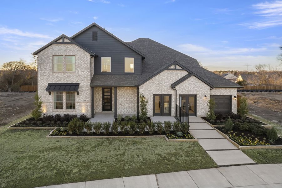 Representative exterior photo of a completed home built from the Kirby by UnionMain Homes in Lake Breeze, Lavon, TX (Image 28).