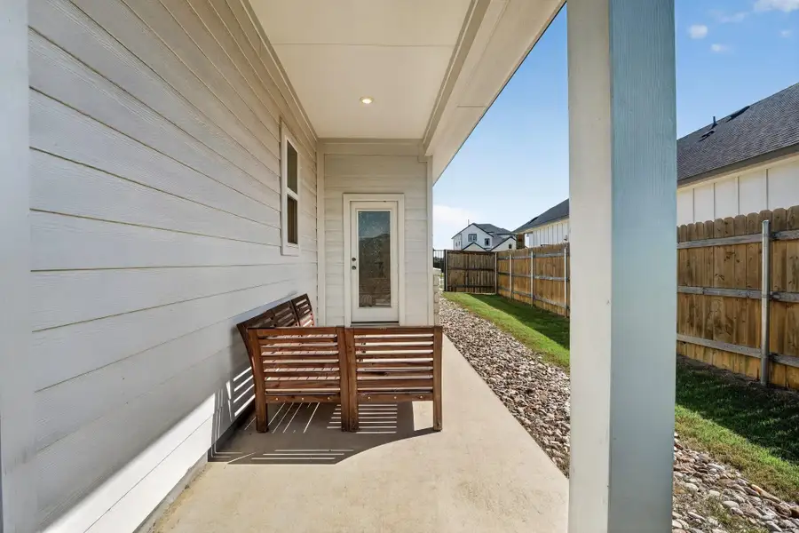 Exterior details and patio area of a home in Cascades at Onion Creek, Austin (Image 26).