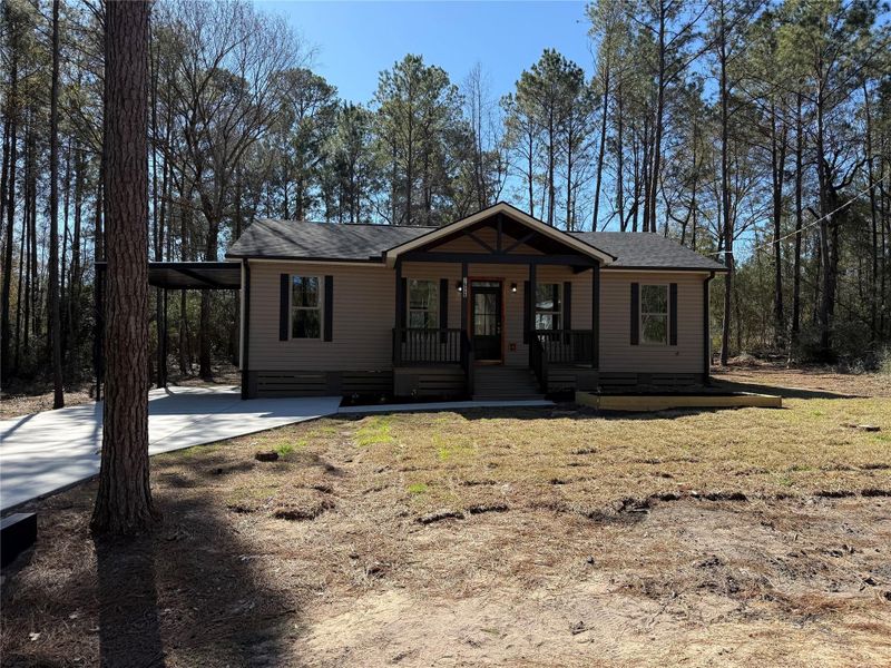 Exterior details and patio area of a home in , Plantersville (Image 23). Exterior details and patio area of a home in , Plantersville (Image 23).