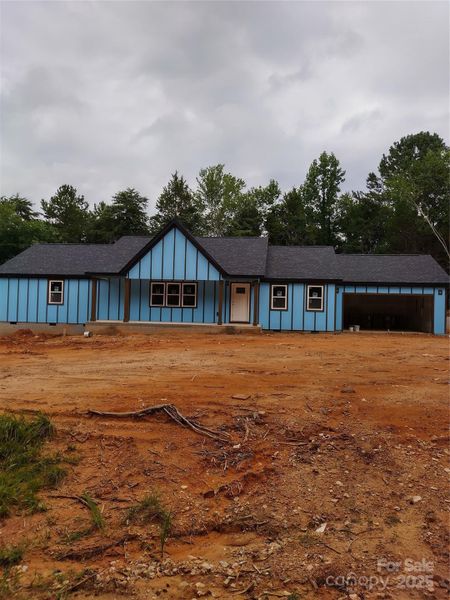 Front exterior of a new home in , Shelby, NC, highlighting curb appeal (Image 1).