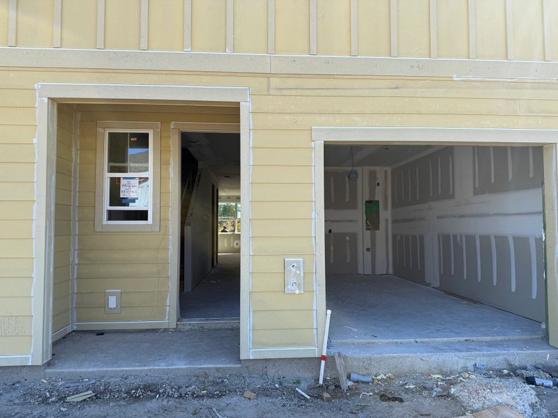 Cozy front porch and garage