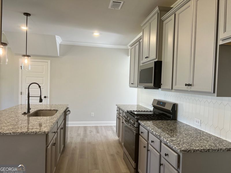 Furnished interior view inside a new home in Crofton Place Enclave, Snellville (Image 6).