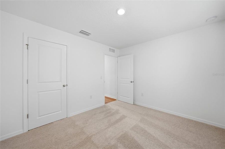 Spacious, unfurnished interior of a new home in , Port Charlotte (Image 38).