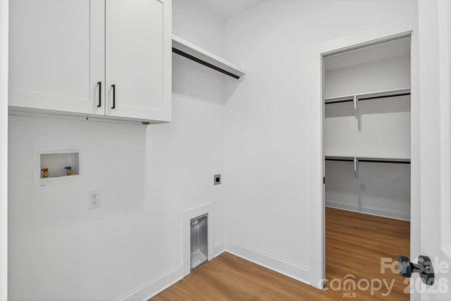 Convenient Laundry off Primary Suite