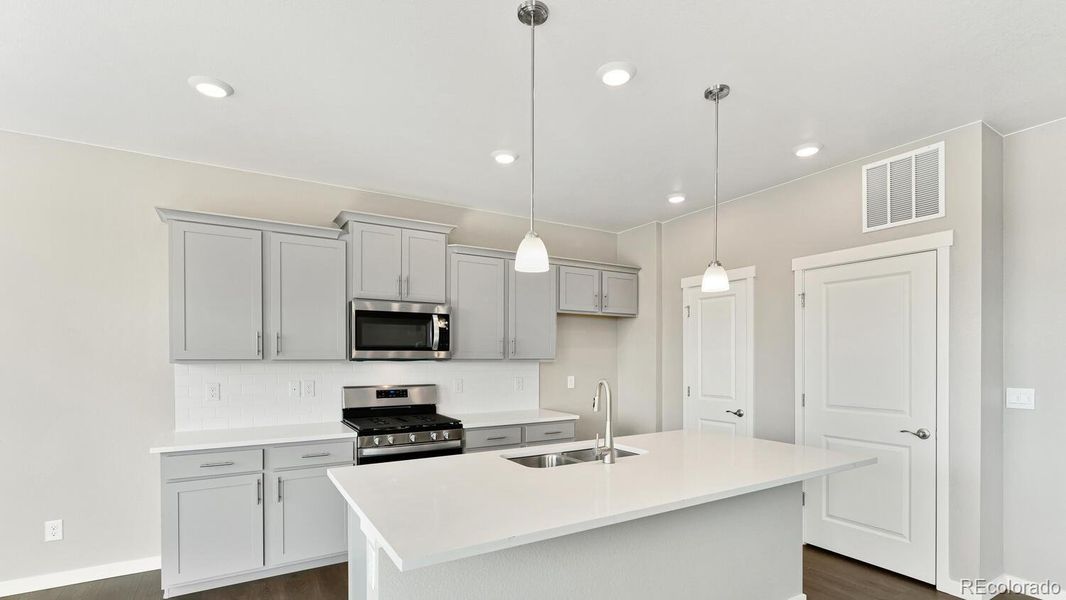Furnished interior view inside a new home in The Ridge at Lorson Ranch, Colorado Springs (Image 12). Furnished interior view inside a new home in The Ridge at Lorson Ranch, Colorado Springs (Image 12).