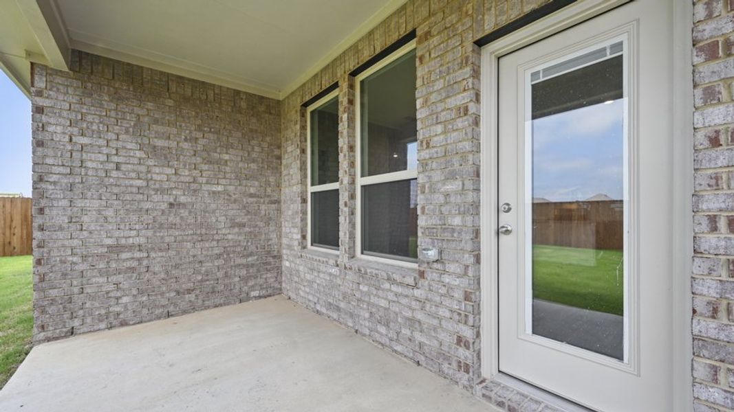 Exterior details and patio area of a home in Lakewood Trails, Forney (Image 3).