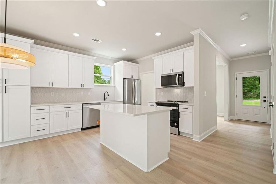 Furnished interior view inside a new home in , White (Image 4). Furnished interior view inside a new home in , White (Image 4).