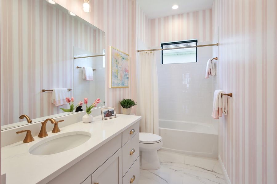 Furnished interior view inside a new home in Boca Royale Golf & Country Club at Wellen Park, Englewood (Image 25).