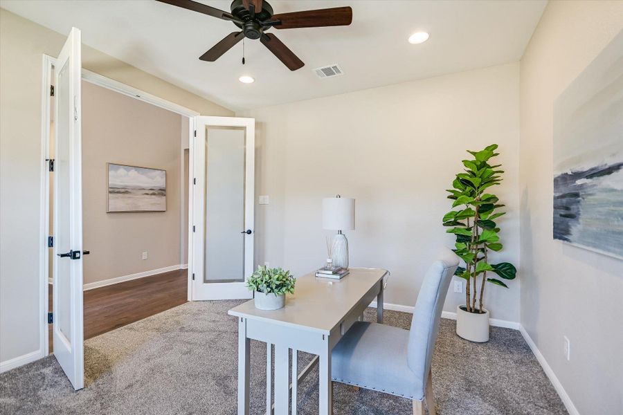 The French doors provide a private workspace.