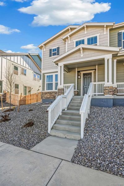Exterior details and patio area of a home in Turnberry, Commerce City (Image 4).
