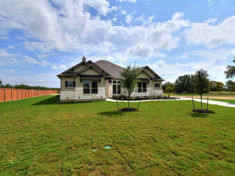 Representative exterior photo of a completed home built from the Siena II by Giddens Homes in Clearwater Ranch, Liberty Hill, TX (Image 43).