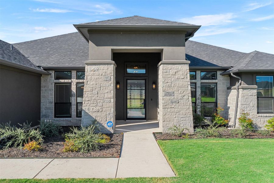 Front exterior of a new home in , Nolanville, TX, highlighting curb appeal (Image 22).