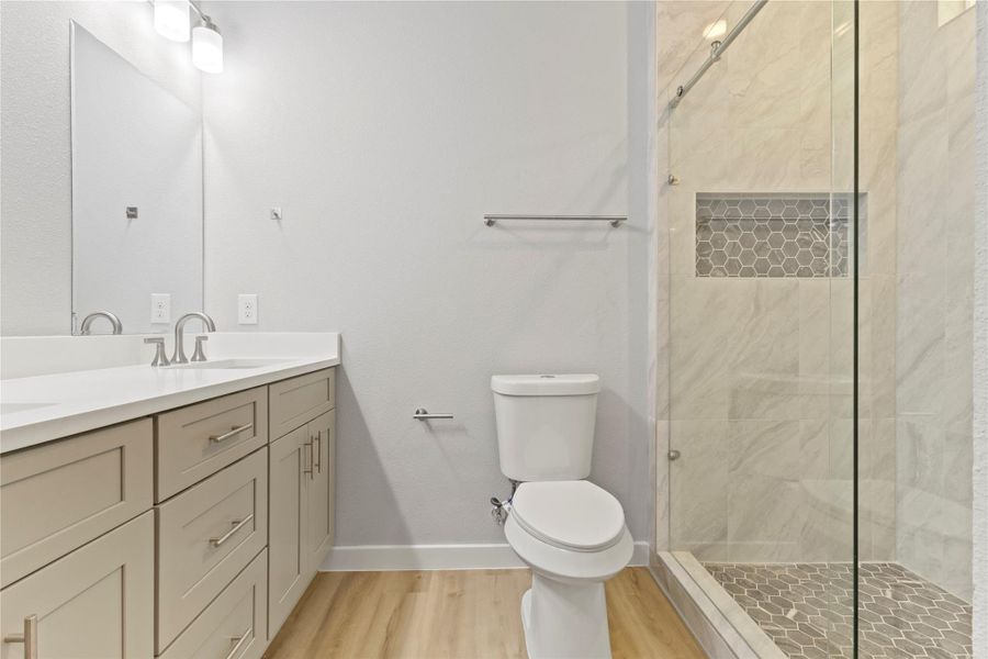 Primary bathroom, with great vanity, and gorgeous fulll size shower.