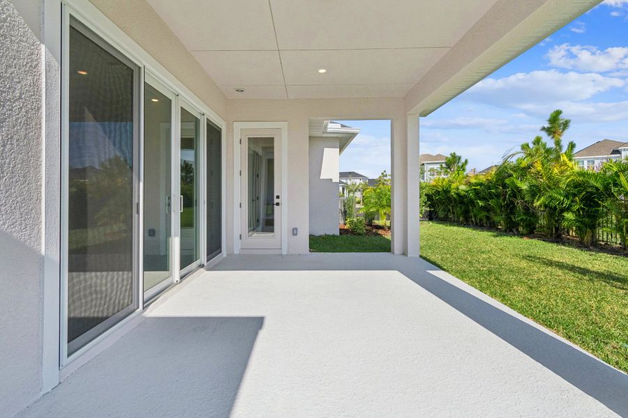 Representative exterior details of a home built from the The Sandbank by David Weekley Homes in Emerald Landing at Waterside at Lakewood Ranch – Lake Series, Sarasota (Image 3).