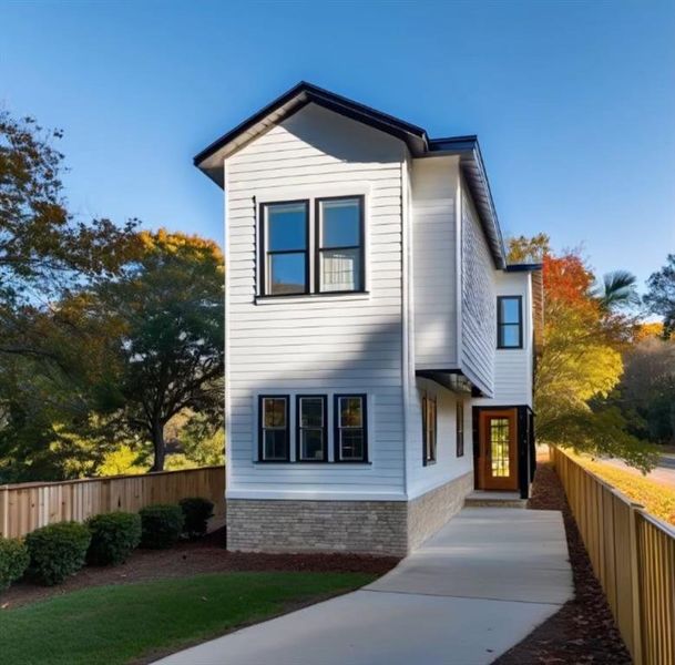 Front exterior of a new home in , Tampa, FL, highlighting curb appeal (Image 1). Front exterior of a new home in , Tampa, FL, highlighting curb appeal (Image 1).