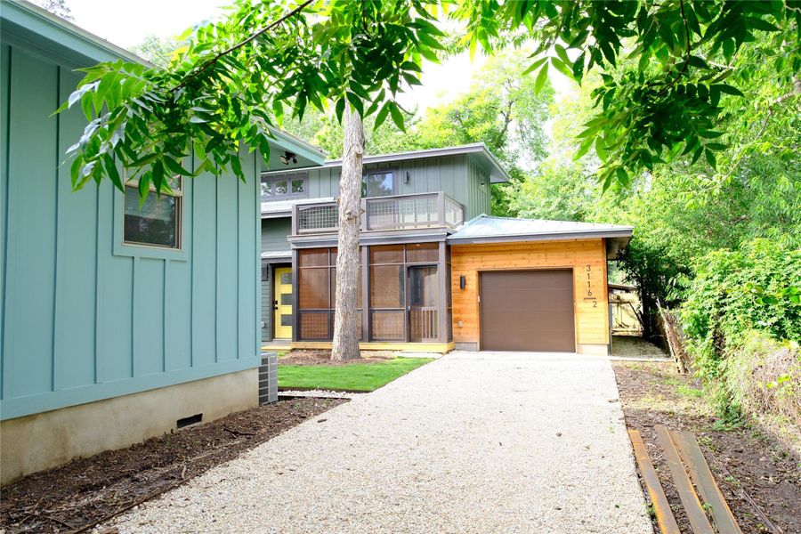 Garage has insulated garage door, is a deep garage and has an EV Charger