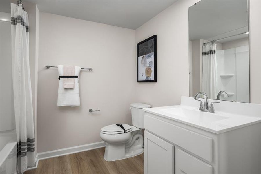 Furnished interior view inside a new home in Highland Park Condos, White House (Image 13).