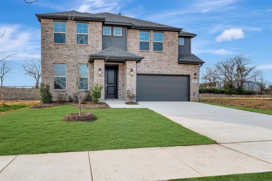 Front exterior of a new home in Vintage Village, Argyle, TX, highlighting curb appeal (Image 19).