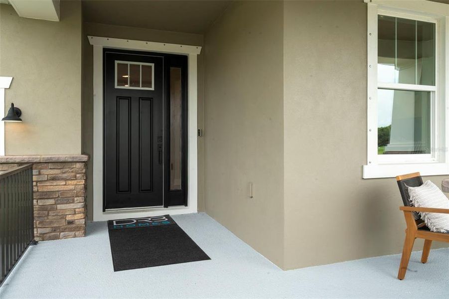 Exterior details and patio area of a home in Primrose at Longleaf, New Port Richey (Image 21).