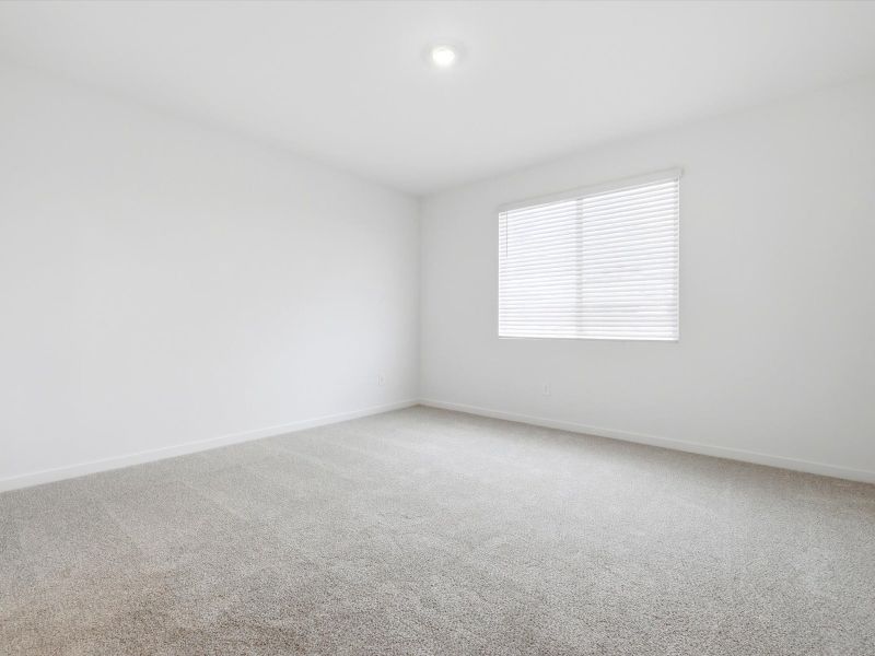 Spacious, unfurnished interior of a new home in Rancho Mirage Estate Series, Maricopa (Image 14).