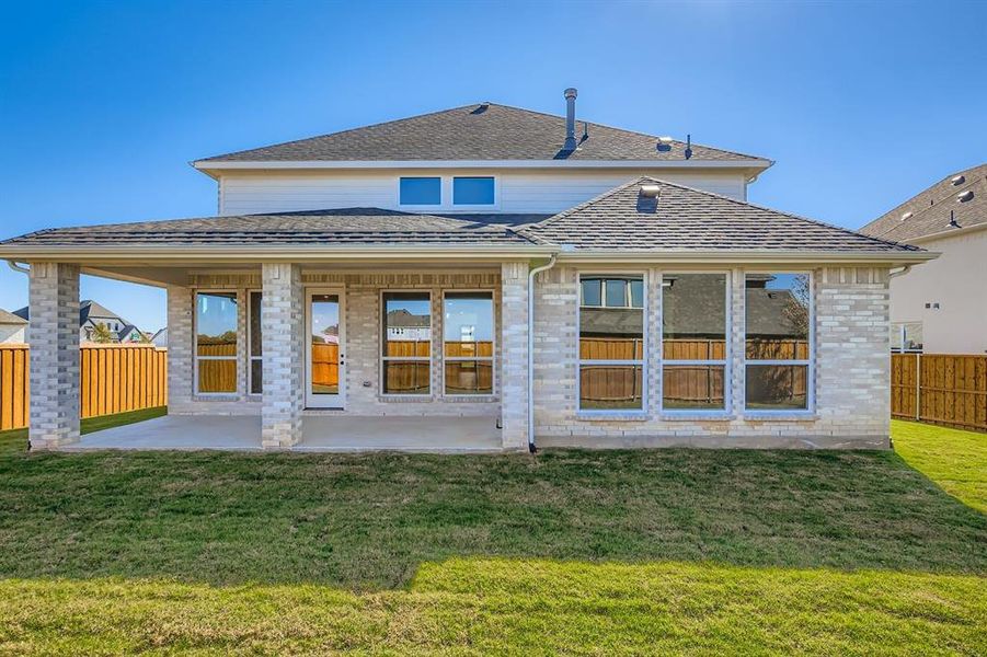 Exterior details and patio area of a home in Star Trail - 55s, Prosper (Image 19).