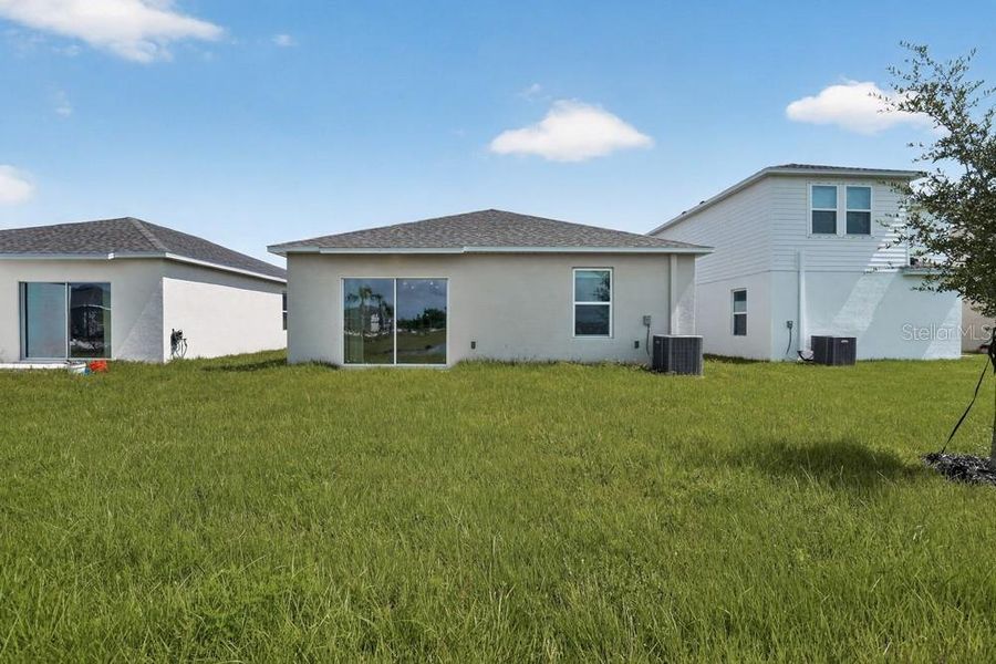 Exterior details and patio area of a home in Firethorn, Parrish (Image 4).