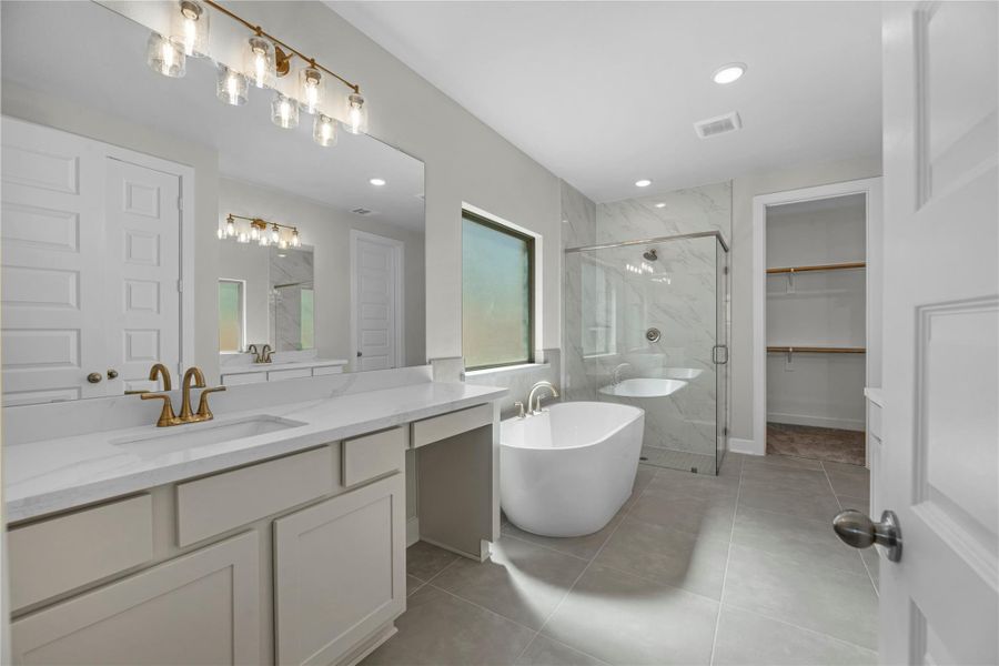 Furnished interior view inside a new home in Sunterra, Katy (Image 7).