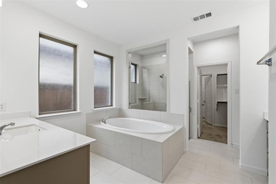 Furnished interior view inside a new home in Prairie Oaks, Oak Point (Image 9). Furnished interior view inside a new home in Prairie Oaks, Oak Point (Image 9).