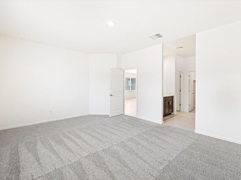 Spacious, unfurnished interior of a new home in Mandarina - Signature Series, Marana (Image 10).