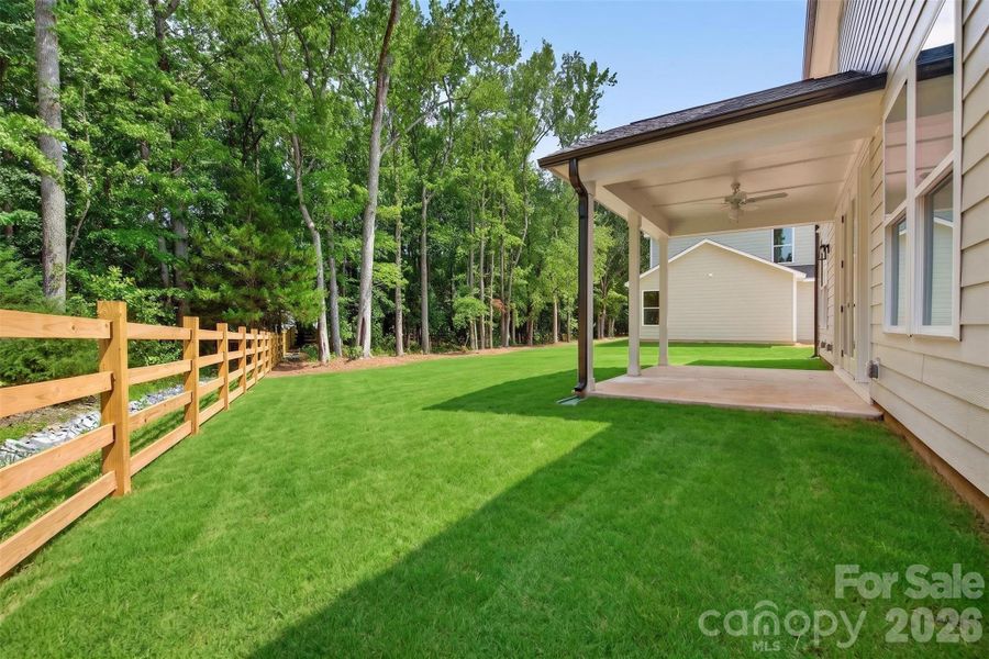 Exterior details and patio area of a home in , Matthews (Image 11). Exterior details and patio area of a home in , Matthews (Image 11).