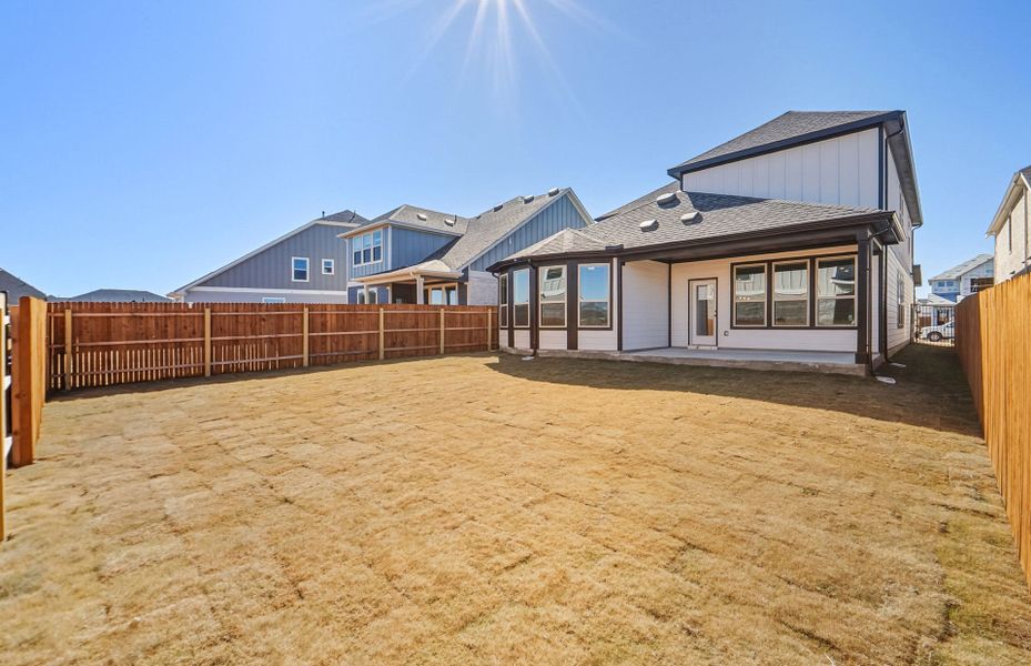 Exterior details and patio area of a home in Santa Rita Ranch, Liberty Hill (Image 24).