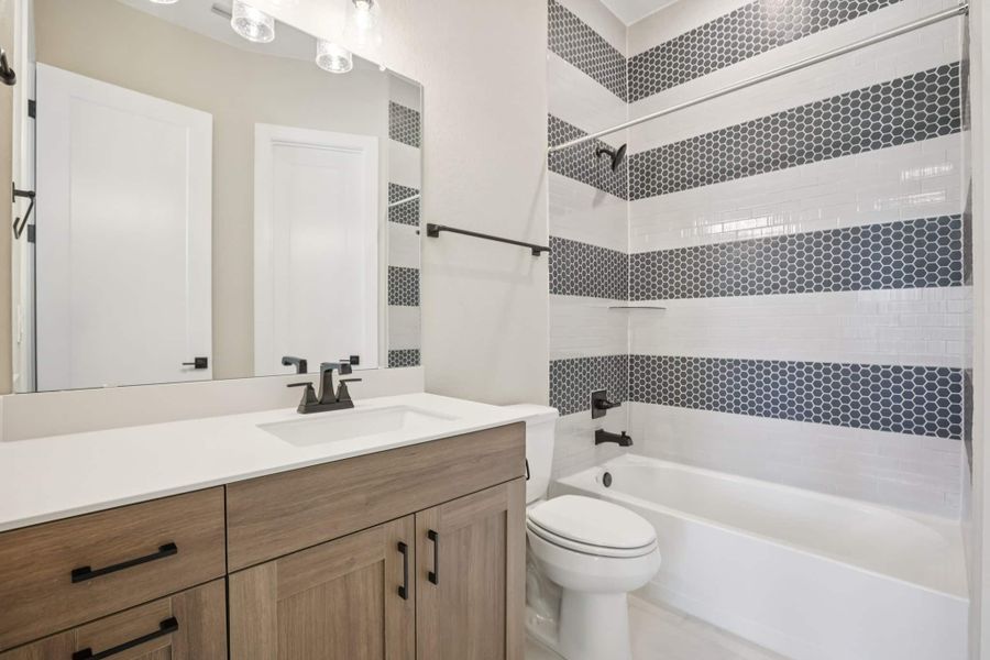 Furnished interior view inside a new home in 6 Creeks, Kyle (Image 18).