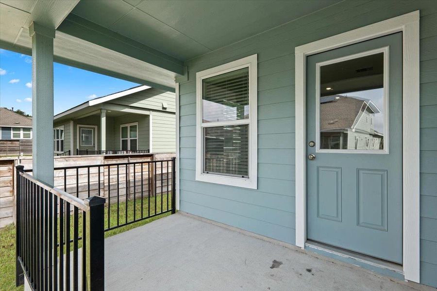A welcoming covered patio extends the living space outdoors, offering a comfortable spot to relax. A welcoming covered patio extends the living space outdoors, offering a comfortable spot to relax.