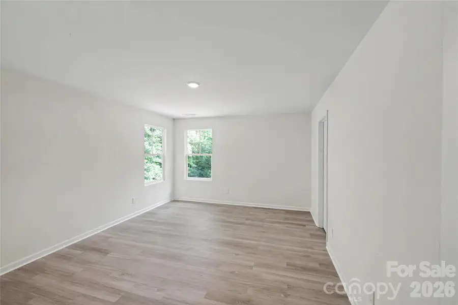 Spacious, unfurnished interior of a new home in , Iron Station (Image 33).