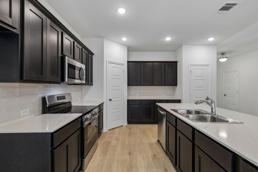 Furnished interior view inside a new home in Eagle Cove, Denton (Image 11).