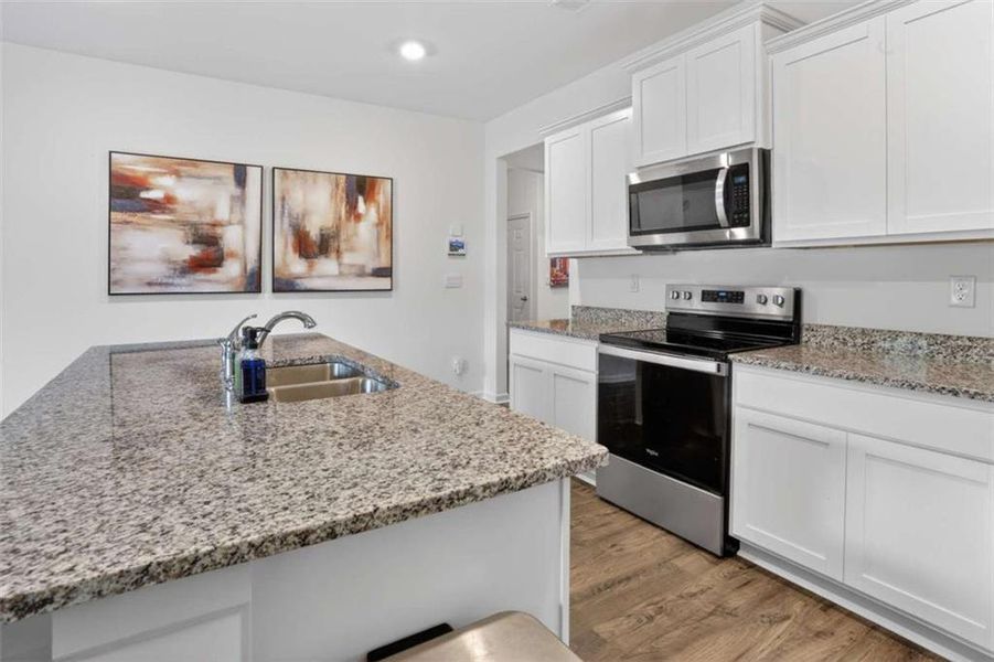 Furnished interior view inside a new home in Champion's Run, Lithonia (Image 8).