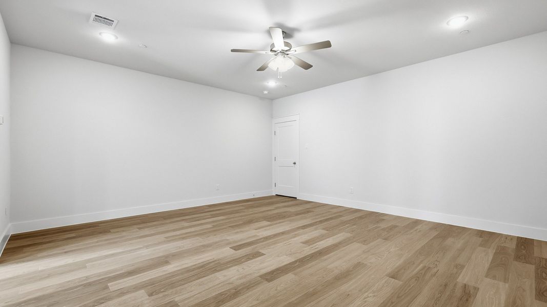 Furnished interior view inside a new home in Collin Creek, Plano (Image 13).