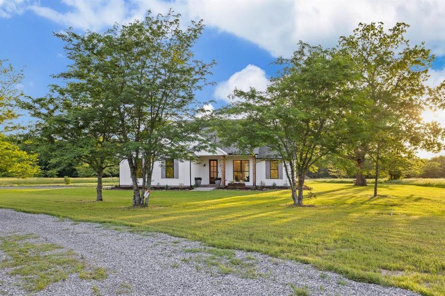 Front exterior of a new home in , Ladonia, TX, highlighting curb appeal (Image 23). Front exterior of a new home in , Ladonia, TX, highlighting curb appeal (Image 23).