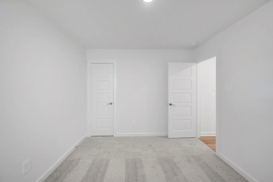 Spacious, unfurnished interior of a new home in Lone Star Landing, Montgomery (Image 17).