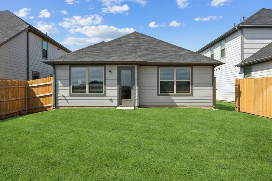 Exterior details and patio area of a home in Trinity Ranch, Elgin (Image 2).