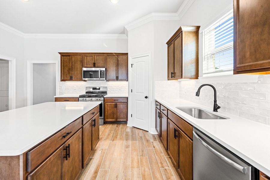Furnished interior view inside a new home in The Bluffs at Lafayette, Freeport (Image 5).