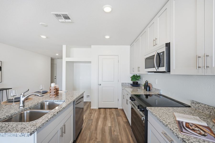 Furnished interior view inside a new home in Cross Creek Ranch, Coolidge (Image 9).