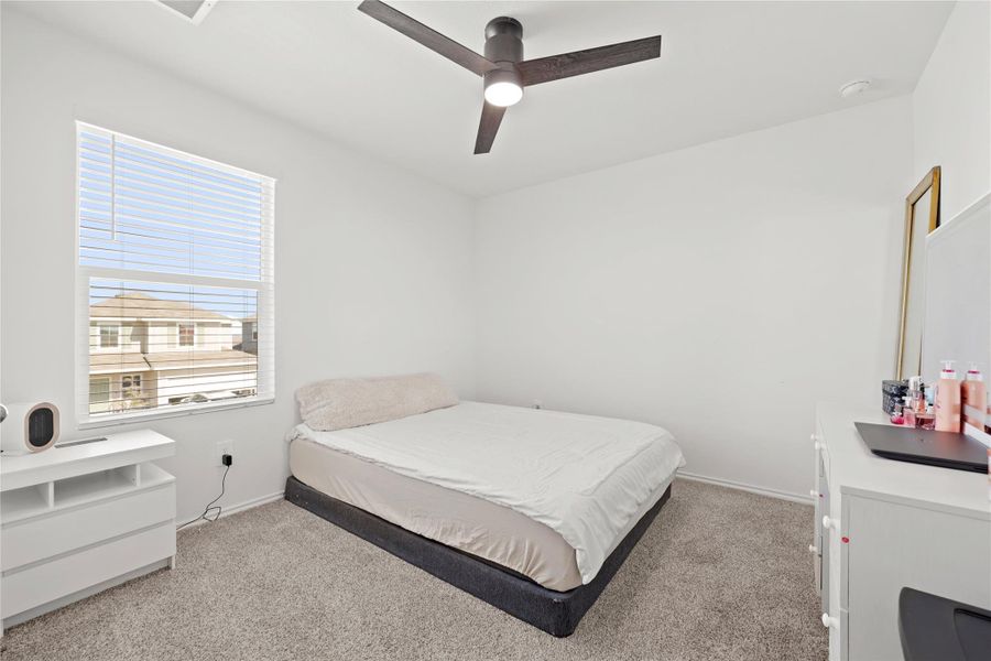 Relax in style in this sun-lit upstairs retreat, offering plenty of room for your favorite furniture and a peaceful atmosphere perfect for winding down.