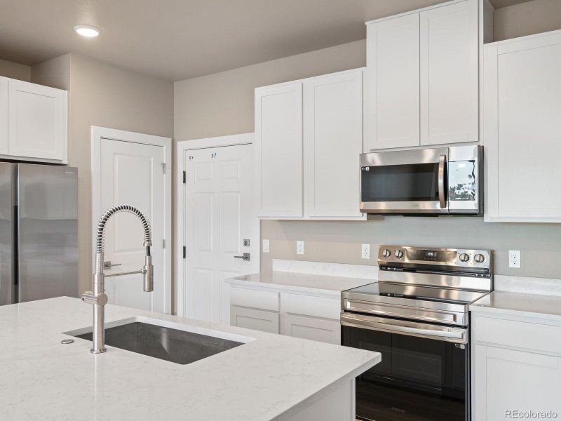 Furnished interior view inside a new home in Gateway Commons, Denver (Image 7).