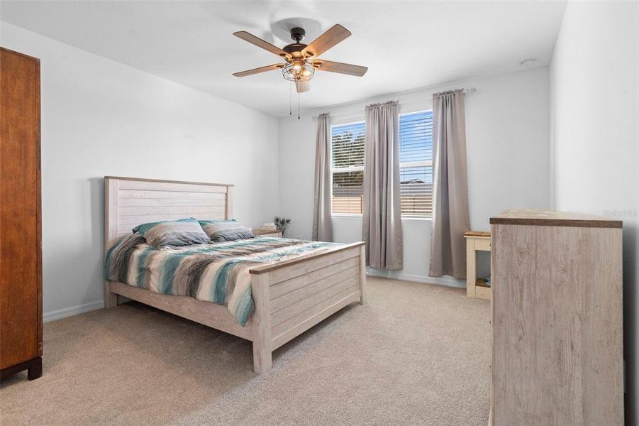 Furnished interior view inside a new home in Deer Run at Crosswinds, Davenport (Image 45).